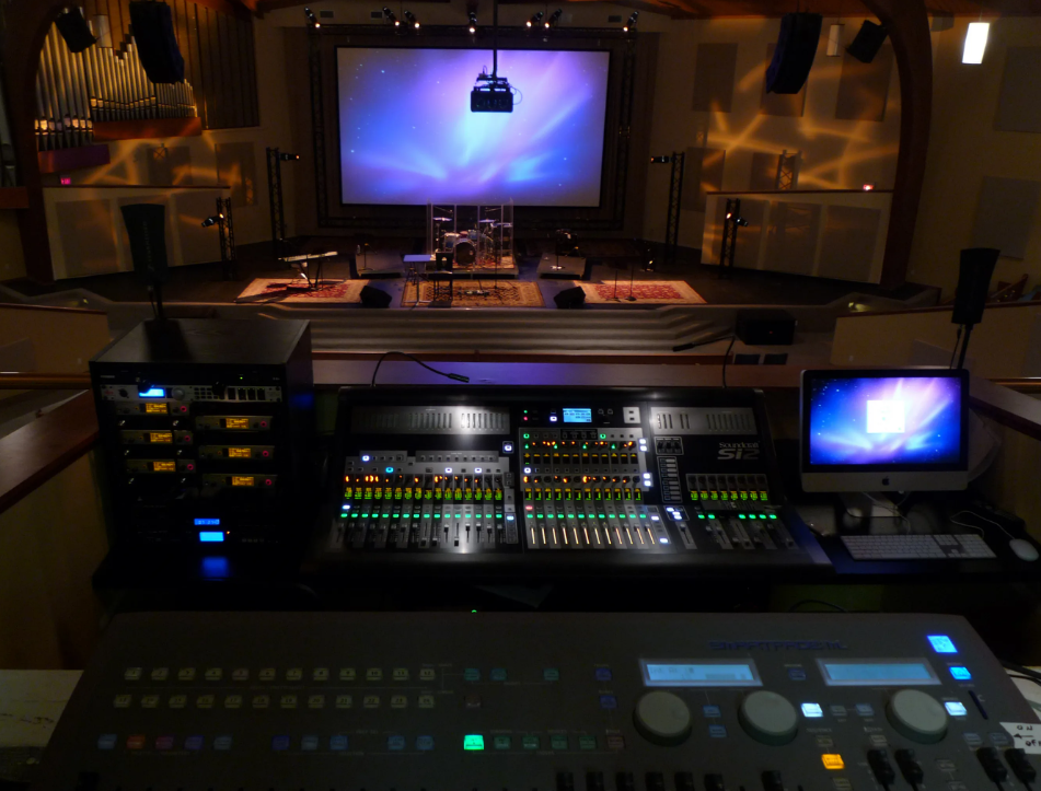 Crew setting up audio and lighting